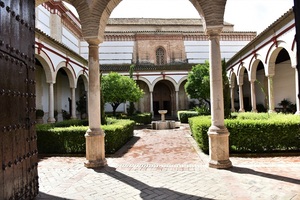At the gate of Iglesia de Santiago in Écija.
