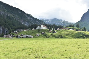 Urnerboden hamlet, Klausen Pass in the background cloud covered (c) nupursworld.com